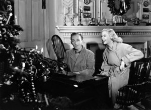 Bing Crosby and Marjorie Reynolds in the scene from "Holiday Inn" in which they sing "White Christmas"